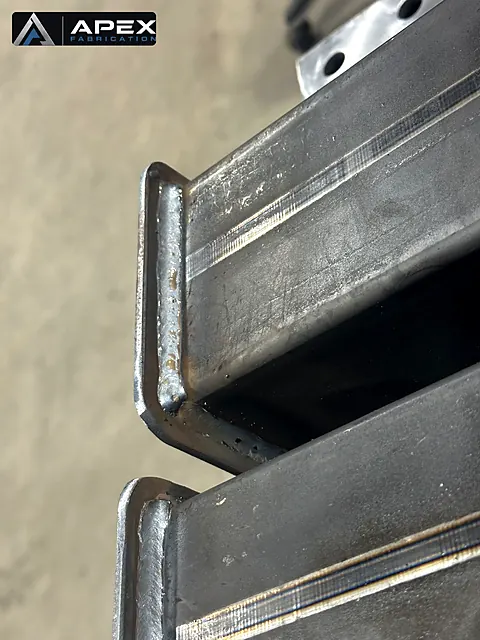 Weld beads at the formed corner of a steel channel section