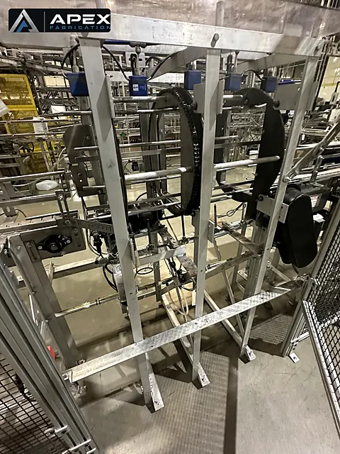 Custom aluminum-framed production machine with chain ring drive viewed through open guarding